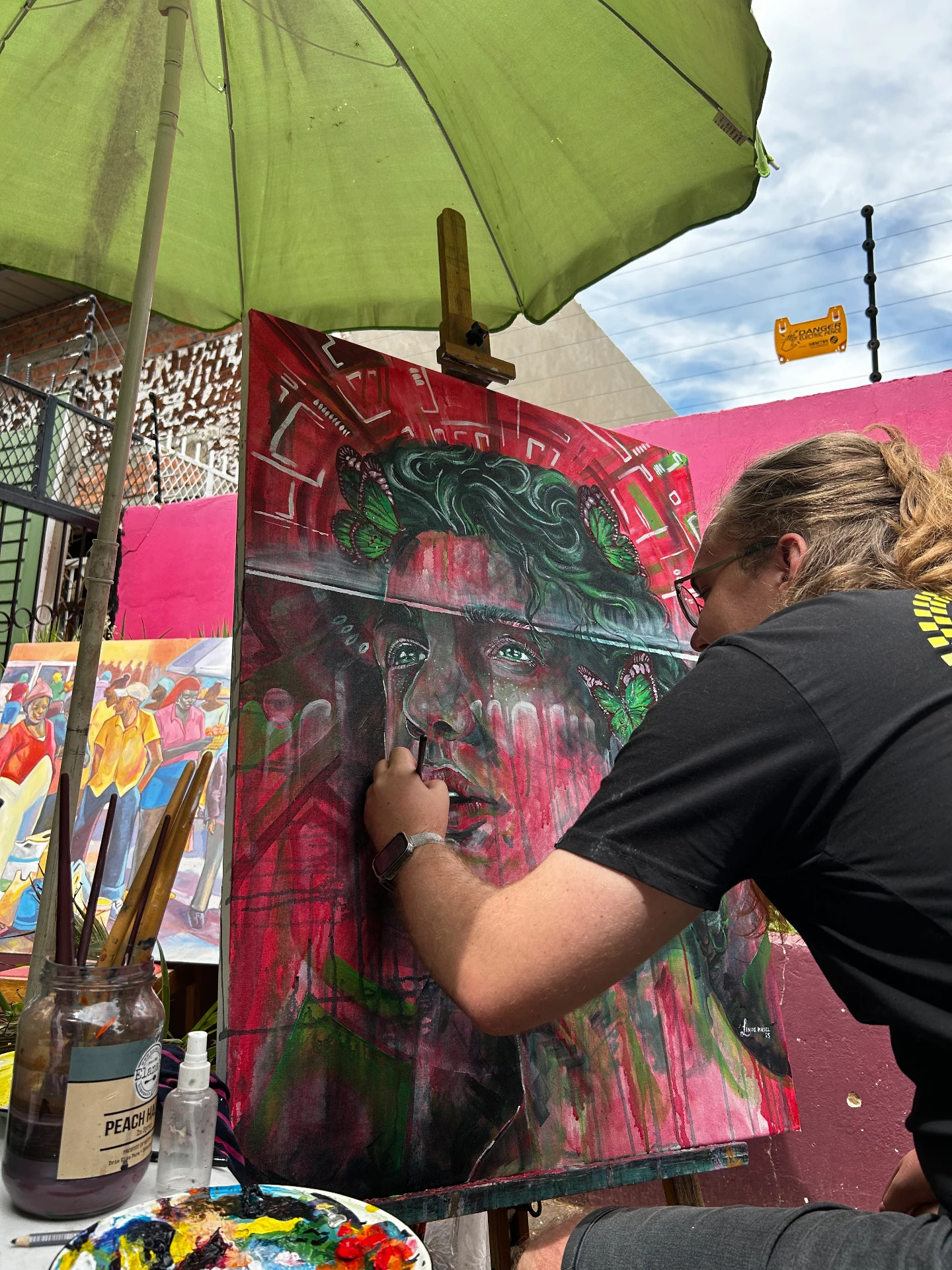 Painting outdoors under the umbrella